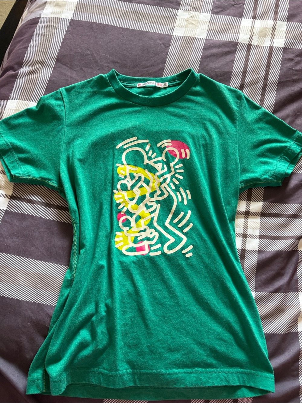 Green T shirt with Keith Haring design